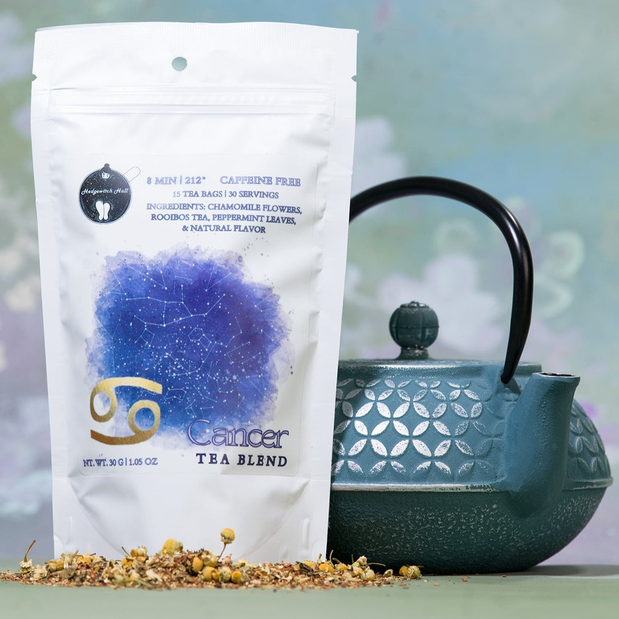 Product photo of Cancer tea blend and teal teapot.