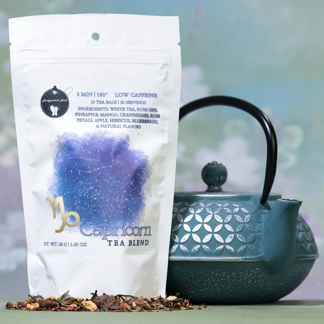 Product photo of Capricorn tea blend and teal teapot.