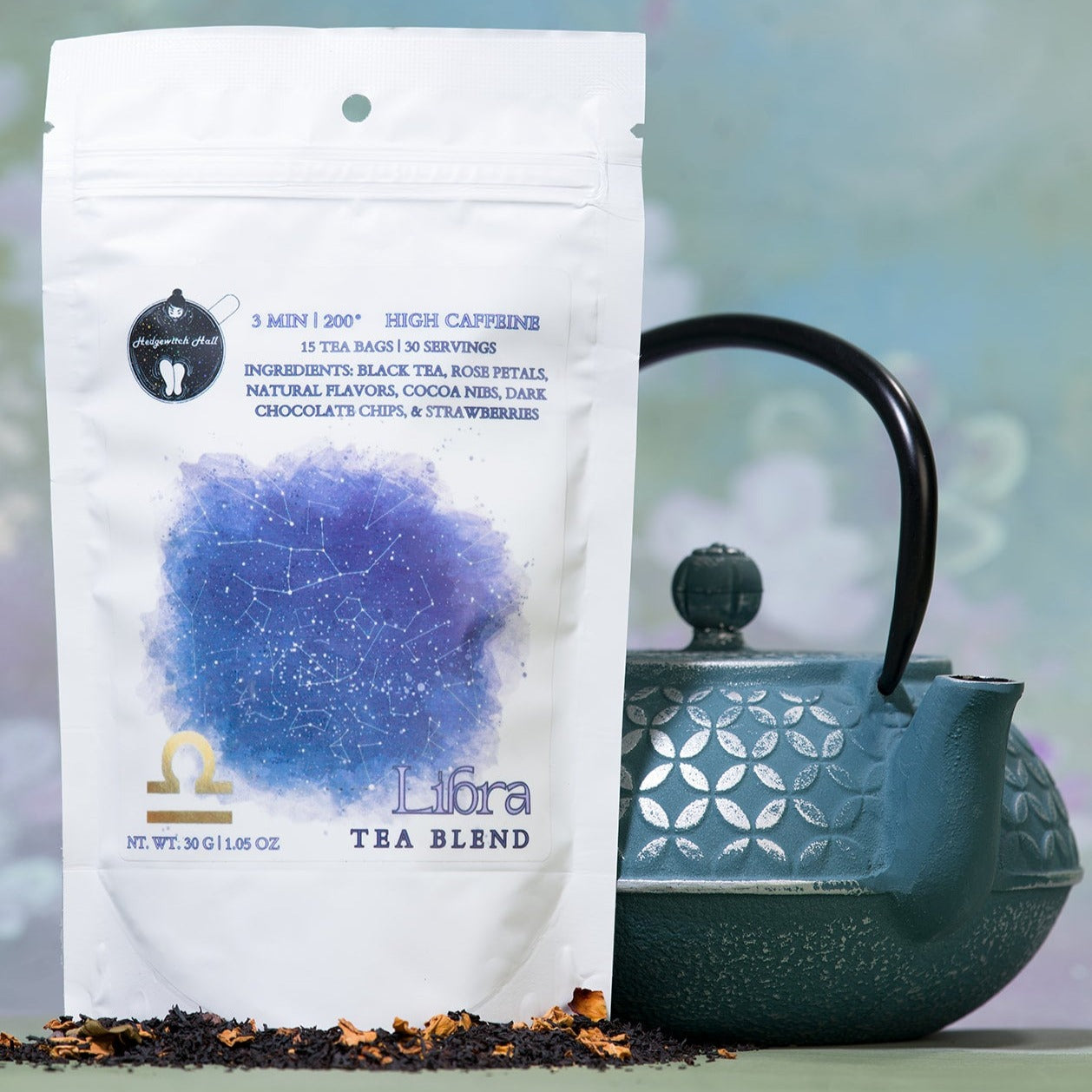 Product photo of Libra tea blend and teal teapot.
