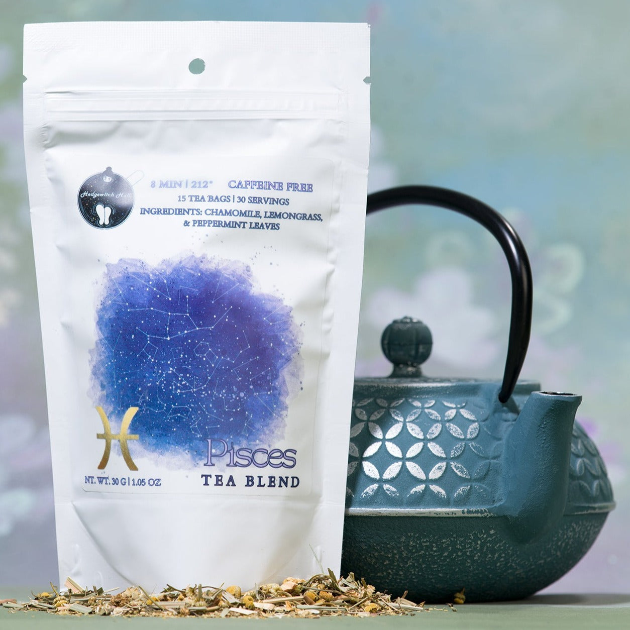 Product photo of Pisces tea blend and teal teapot.