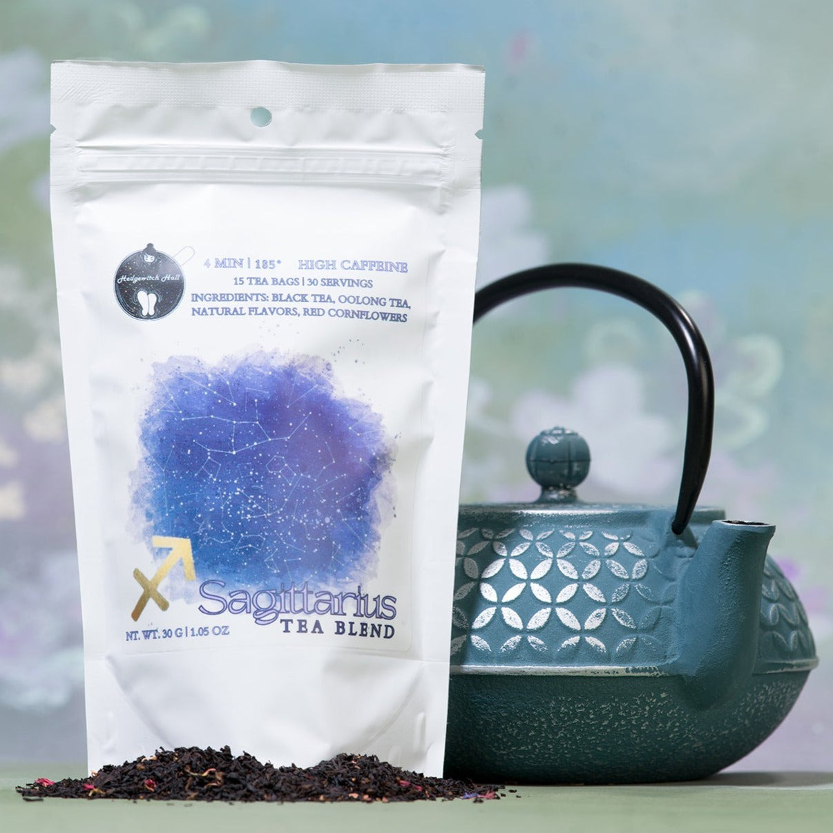 Product photo of Sagittarius tea blend and teal teapot.
