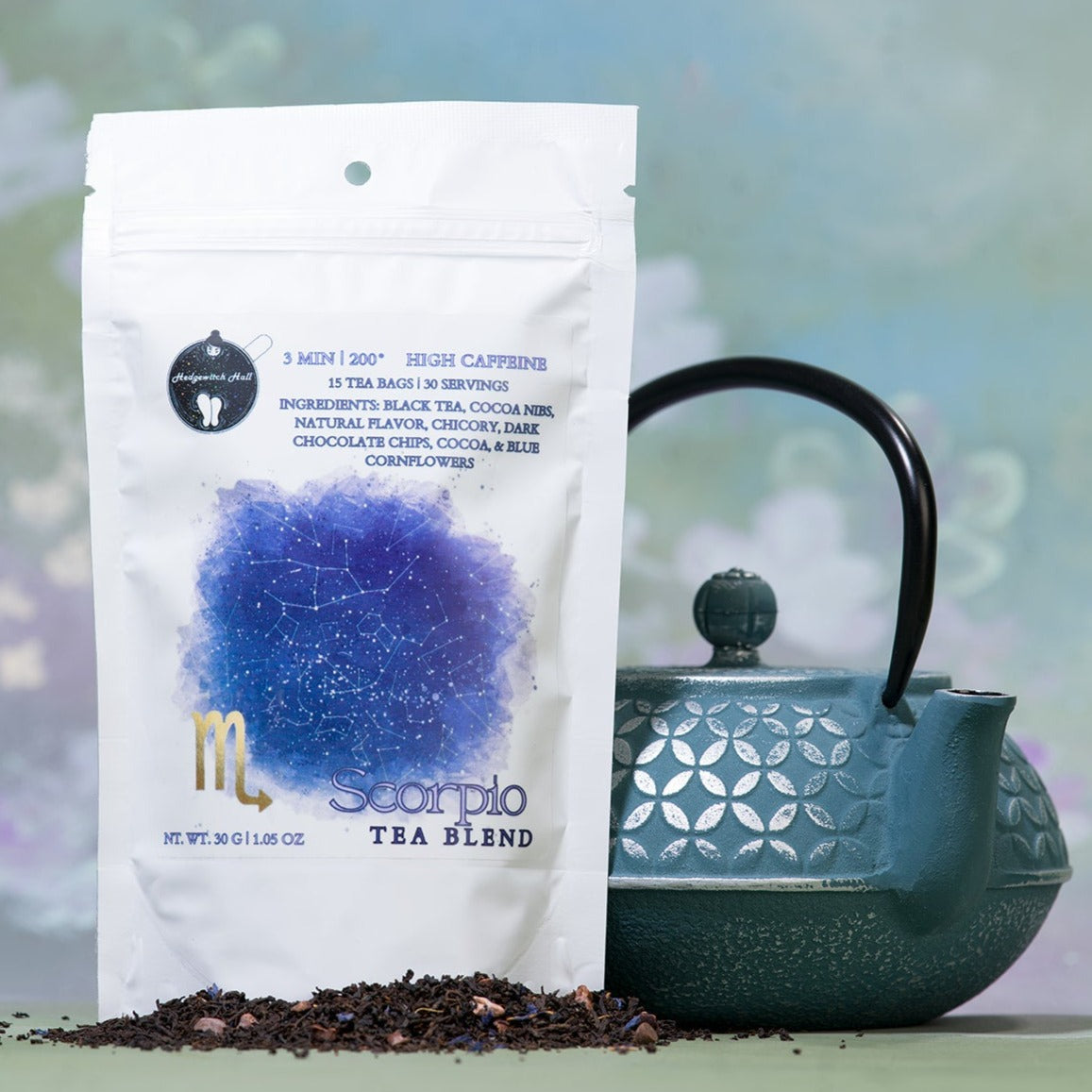 Product photo of Scorpio tea blend and teal teapot.
